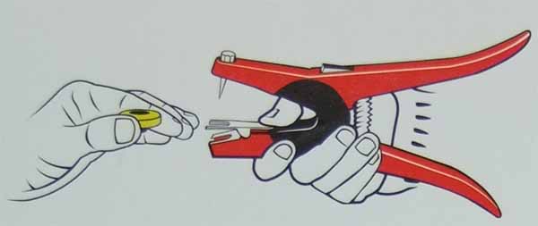 Slip male tag completely onto application pin Slip male tag completely onto application pin